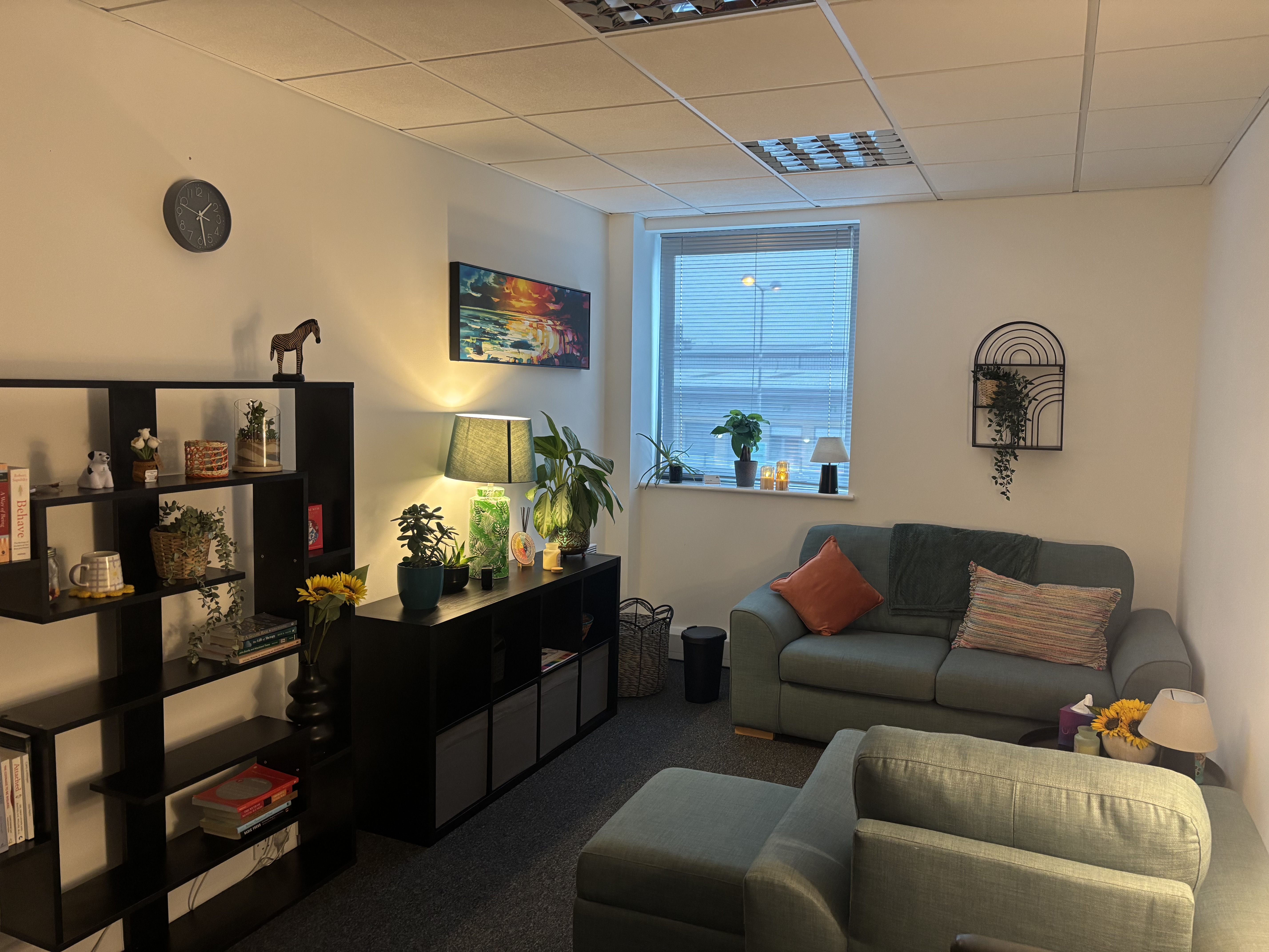 Comfortable counselling room with sofa