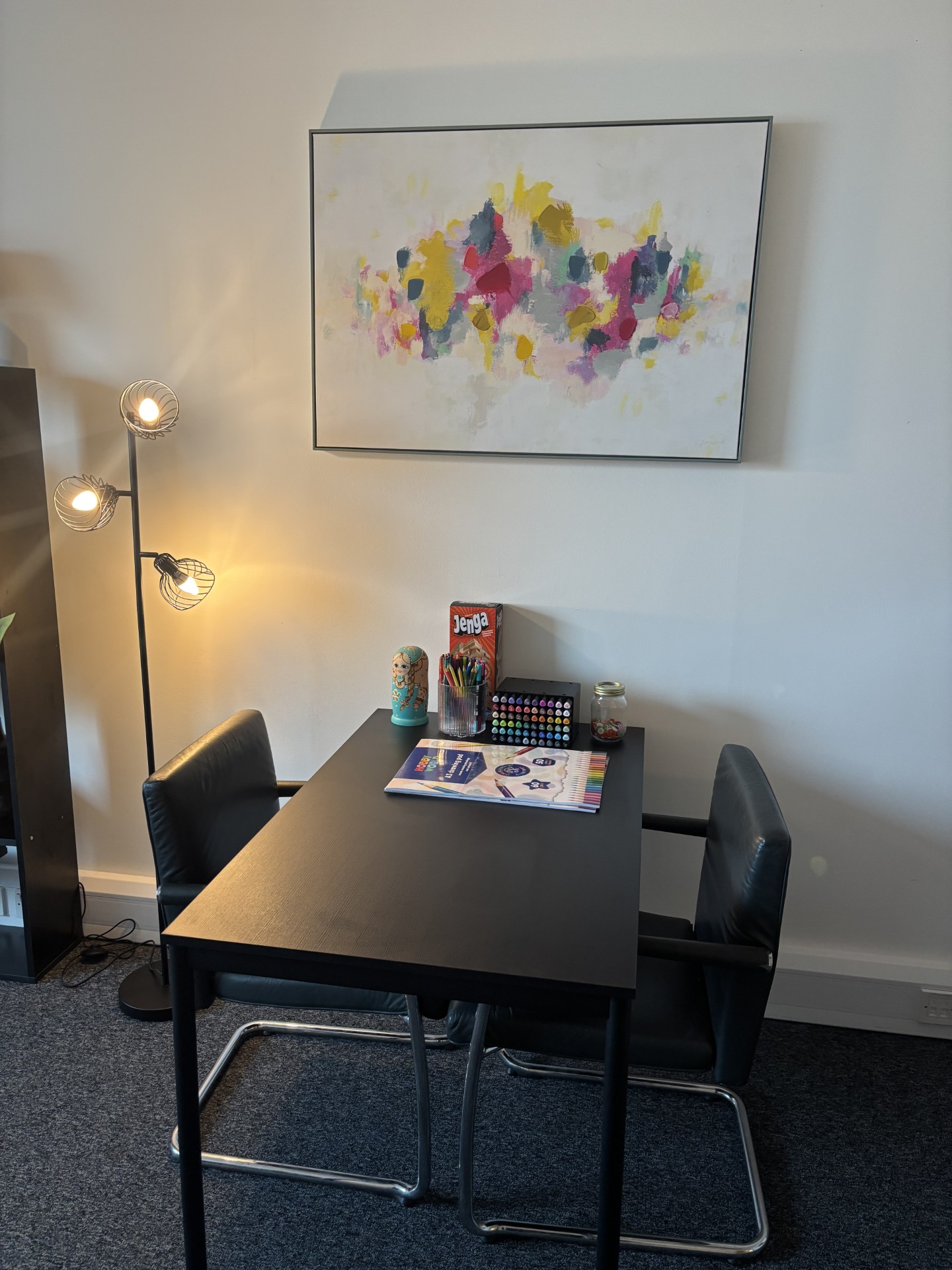Counselling room with neutral tones and calm decor
